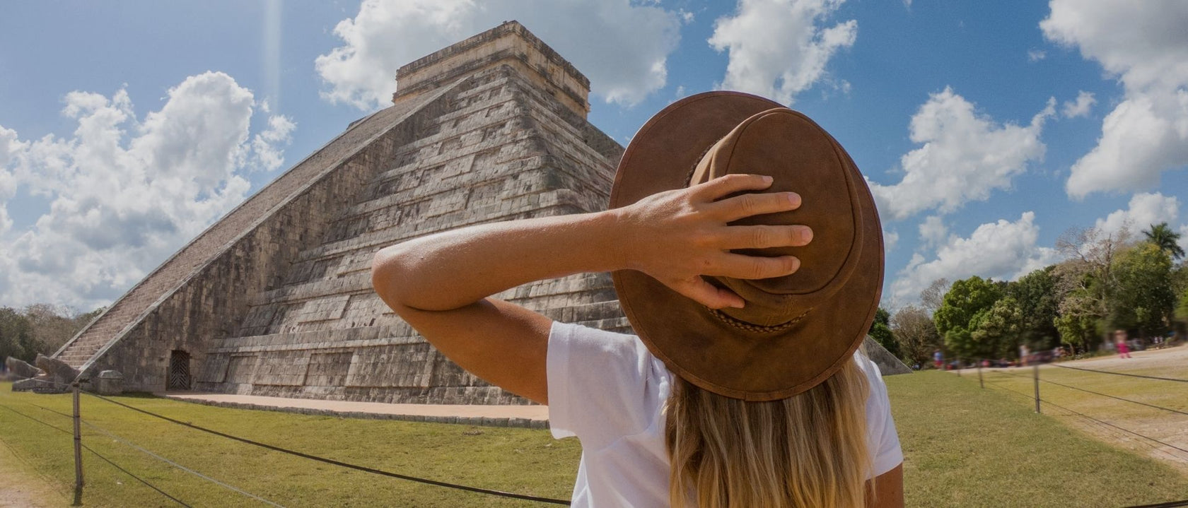 Woman looking at Mexican pyramid